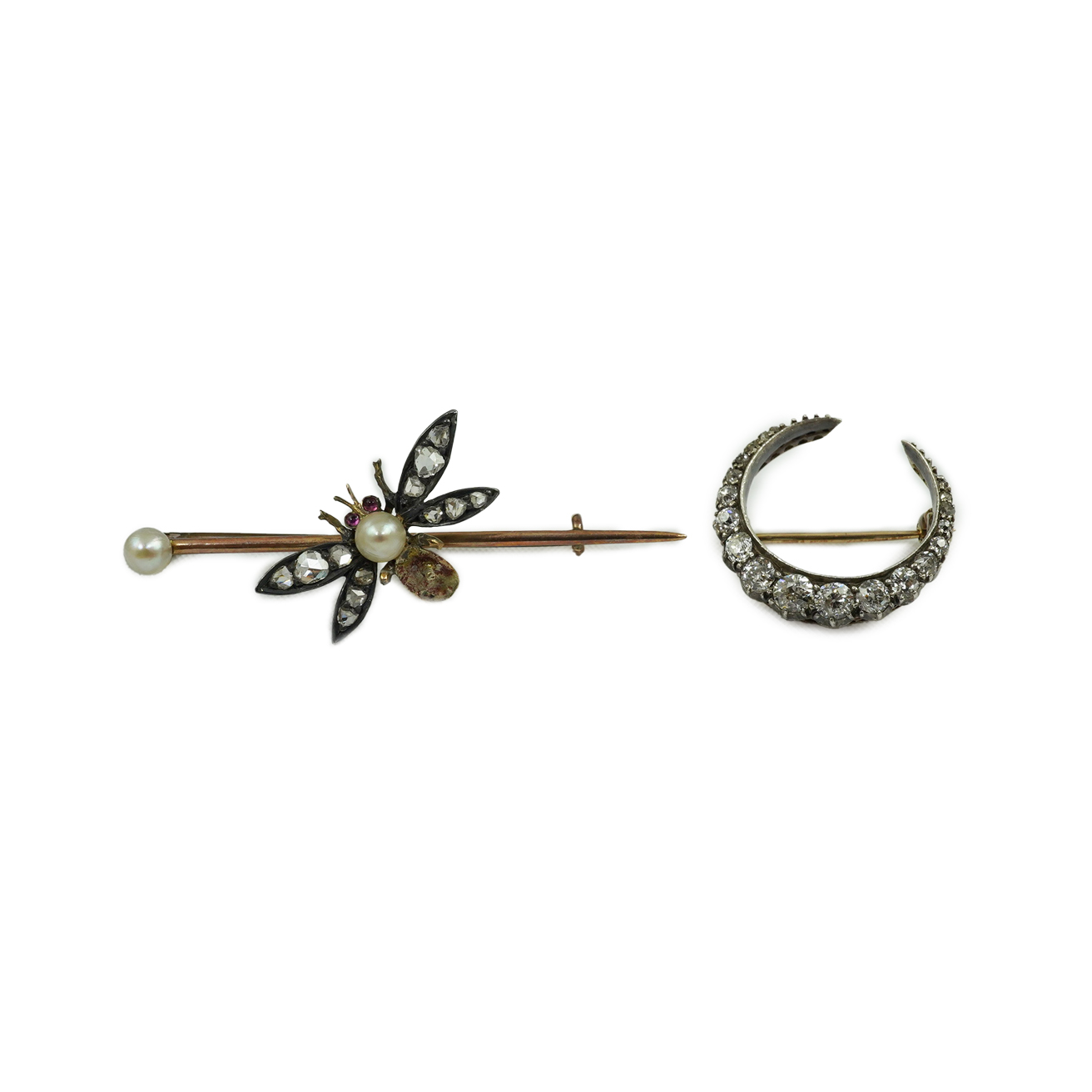 An Edwardian gold and graduated diamond set crescent brooch, 20mm, together with a similar gold, seed pearl diamond and cabochon set bug bar brooch (stone missing), 47mm